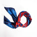 Onlewo 'Singapore Orchid' silk scarf styled — elegant orchid floral pattern celebrating Singapore as a garden city, 100% mulberry silk